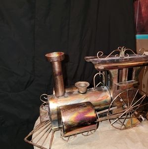 Metal Train locomotive wind up music box.  12 inches long 7&1/2 inches tall.